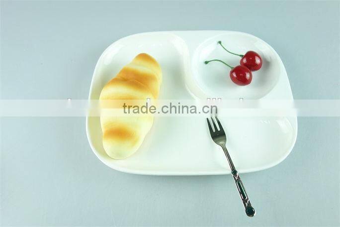 stocked white ceramic rectangle French fries serving plate with dipping dish and iron stand