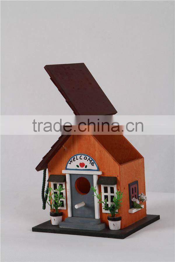 New wooden yellow colored birdhouse for decoration birdcage