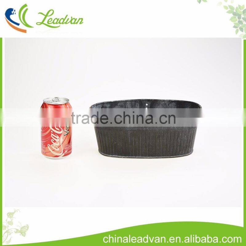 bulk decorative black oval shape planter metal flower pot with vertical stripes