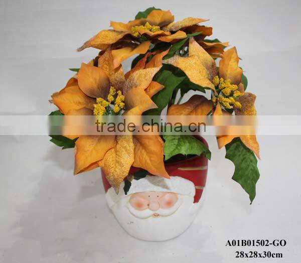 white plastic poinsettia with pot