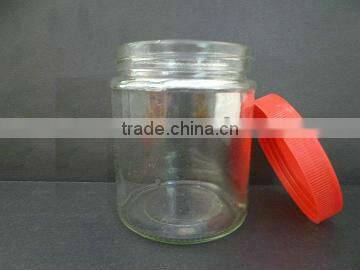 clear storage jar for honey, empty glass bottle