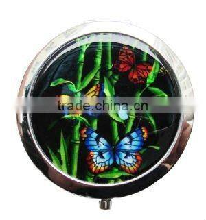 round compact shell mirror with butterfly