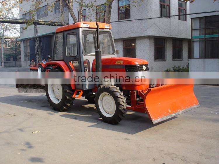 tractor mounted agricultural equipment with snow blade