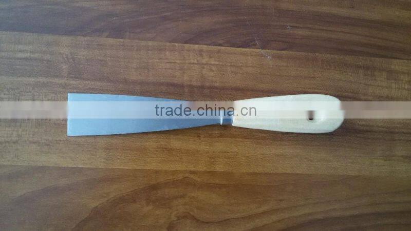 Scraper with wooden handle