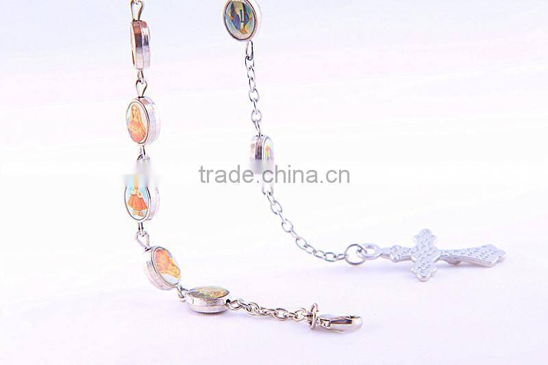 Rosary beads with saint medals