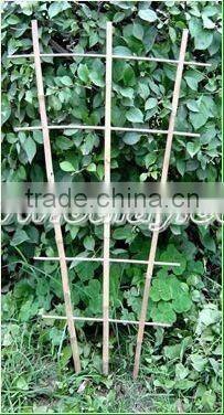 Hand-assembled bamboo trellis with small package