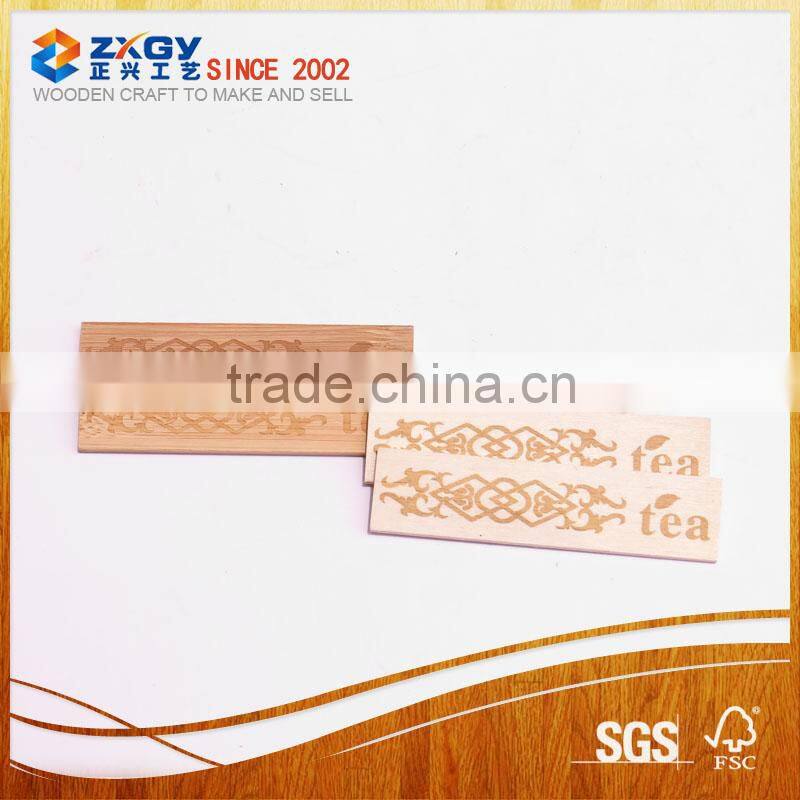 Pine wood tag with flower lasering