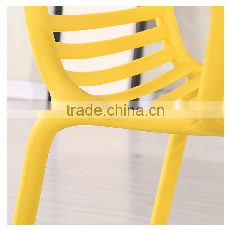 Used plastic armrest dining chairs