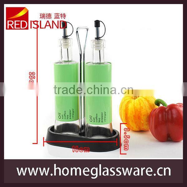 Round olive oil and vinegar bottle with coating and base
