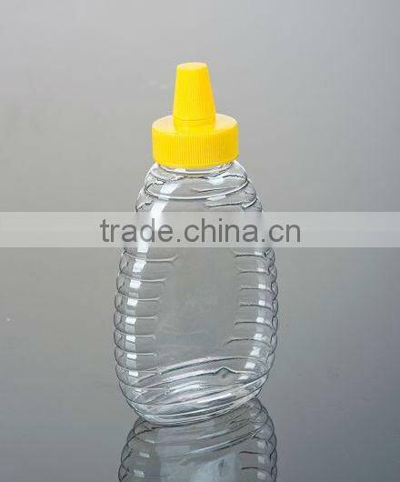 PET jar with needle nose lid 500ml honey Plastic bottle