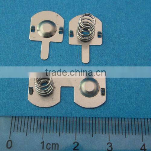 BUTTON CELLS RETAINER