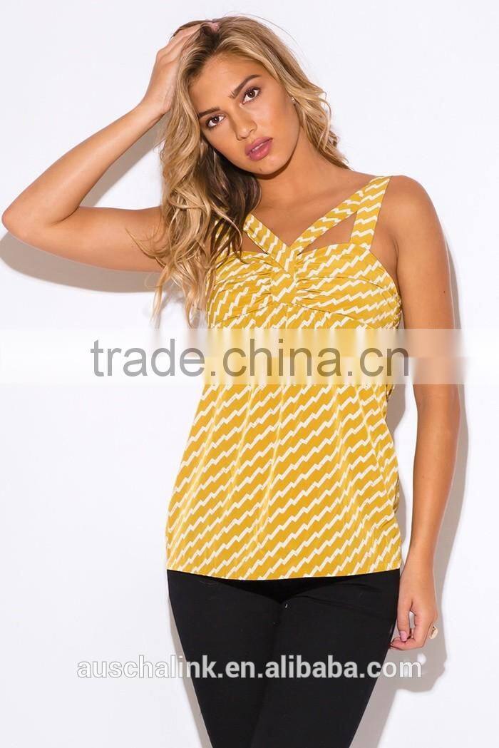 trendy woman yellow chevron print cut out party bulk tank top