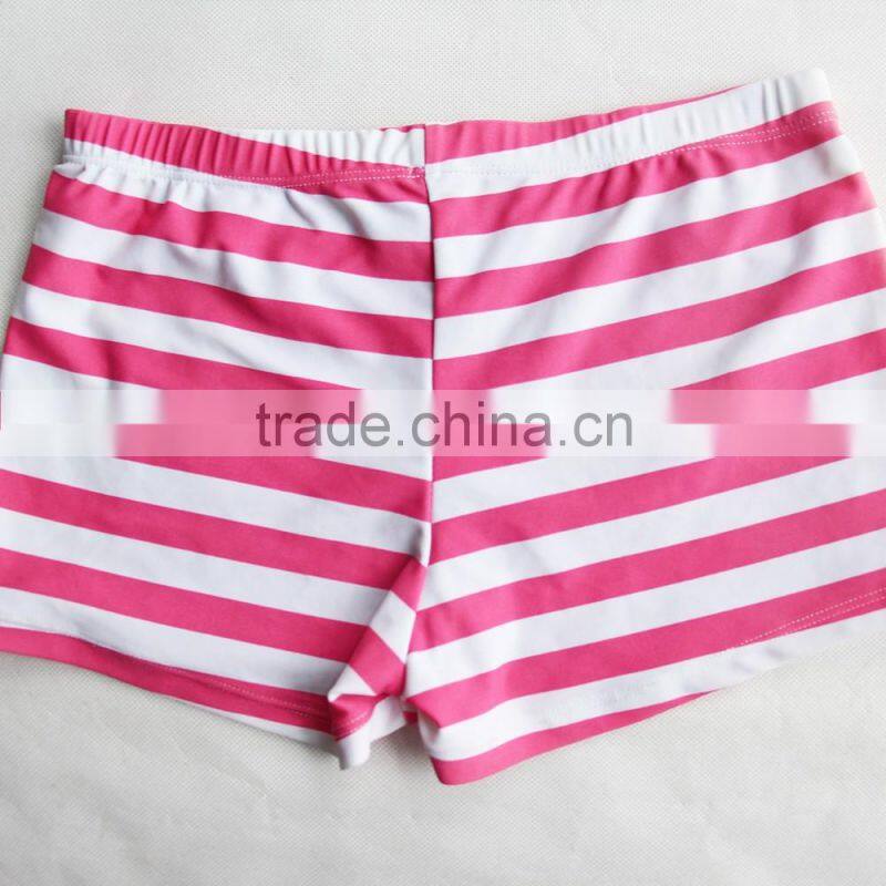 pink and white child swimwear