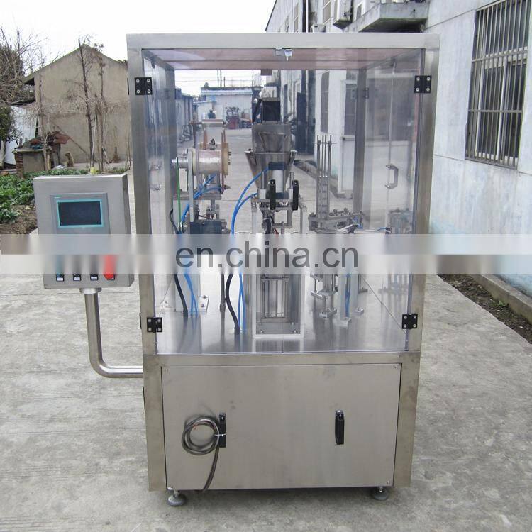 Rotary plastic cup filler and sealer machine