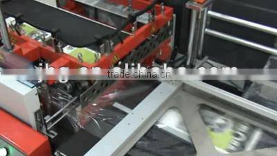 Vertical L type shrink wrapping machine