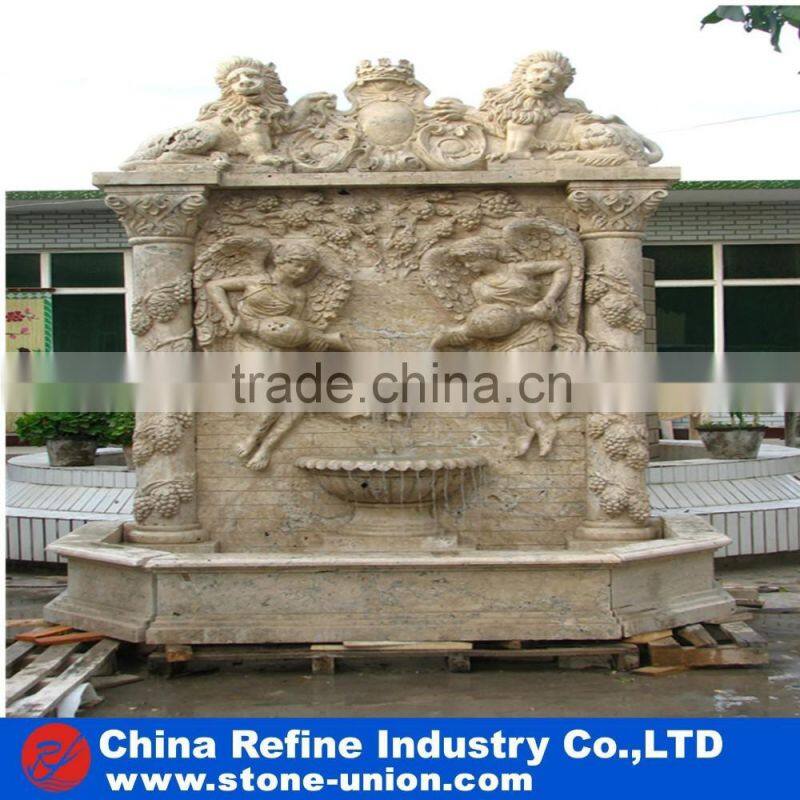 wall fountain carved with human figures