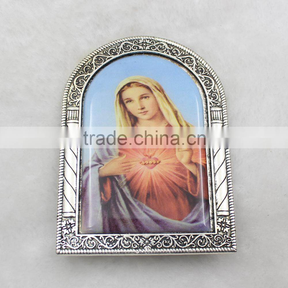 Small Virgin Mary icon with metal holder