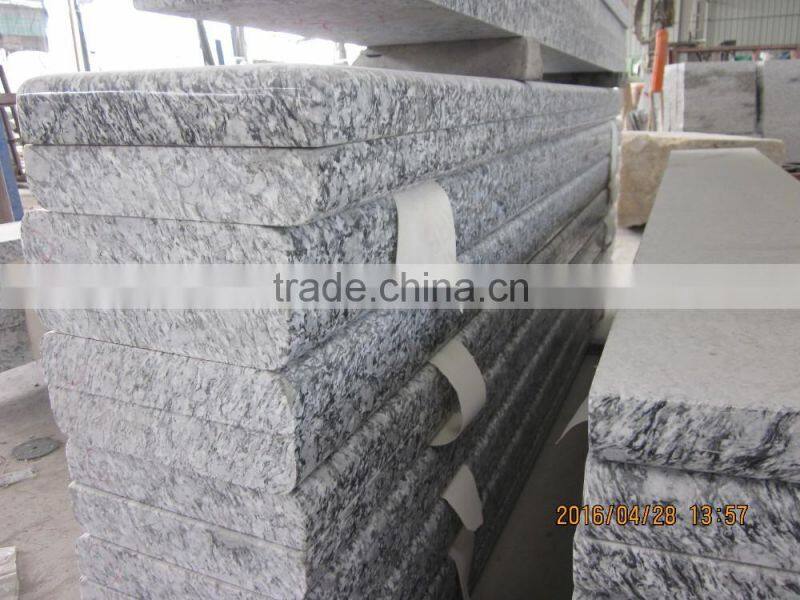 China spray white granite tile prices