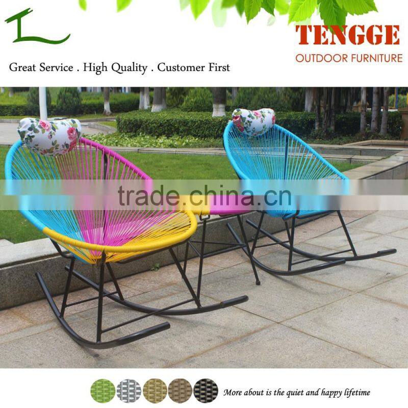 Turquoise color small round rattan acapulco chair and table