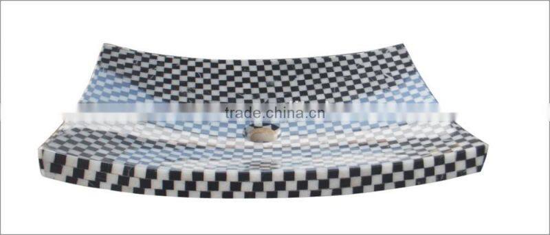 Polished black and white marble mosaic sink