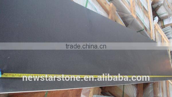 Honed grey andesite stone