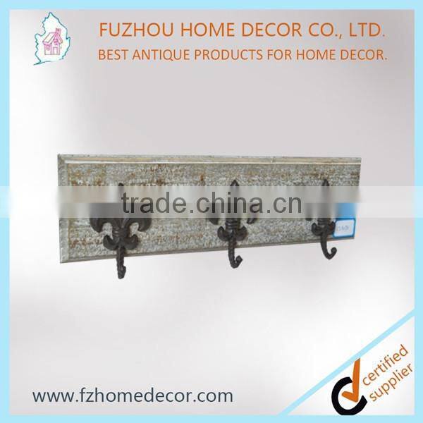 The Cast iron hook for hanging with wooden base