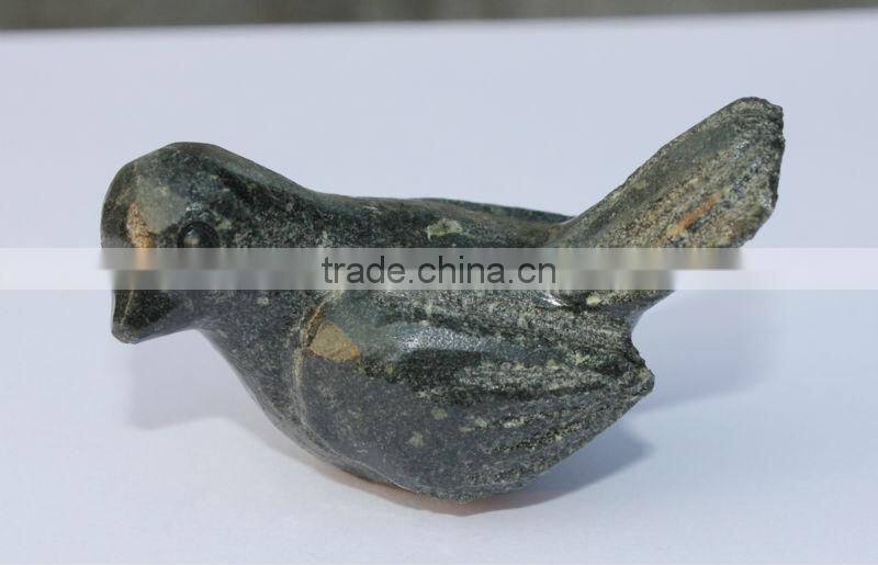 hand carved stone bird sculpture