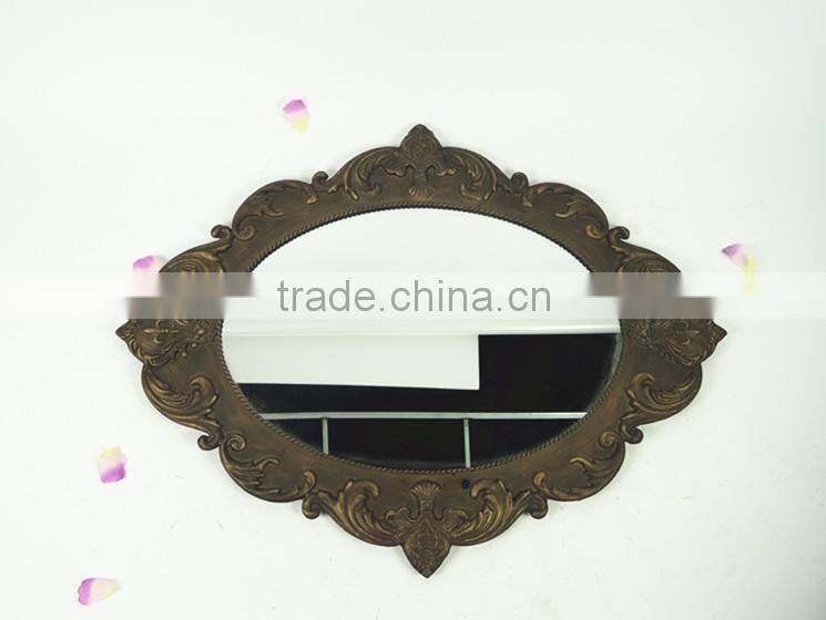 Shabby chic metal antique wall mirror in oval shape