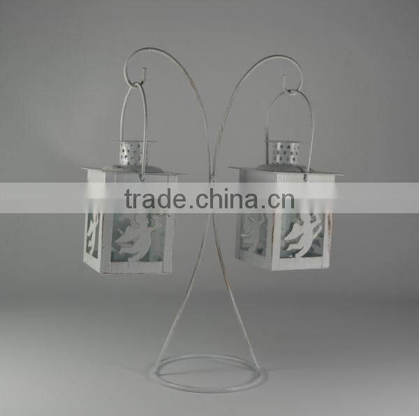 Metal stand with two angel lantern