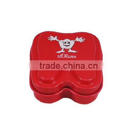 tin for soap in tooth shape