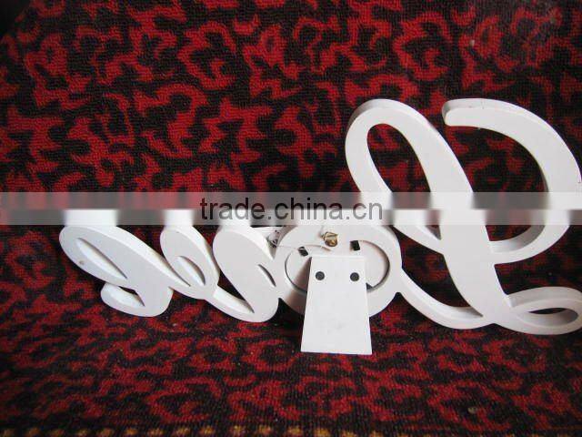 white home wooden letter
