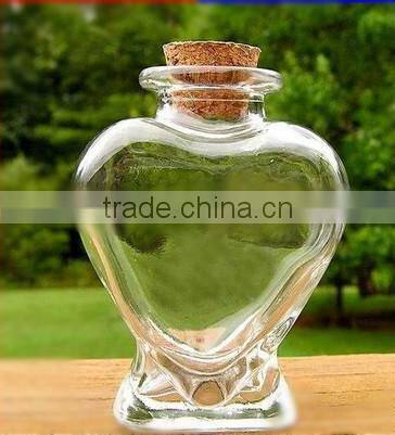 Heart shaped glass bottle with cork