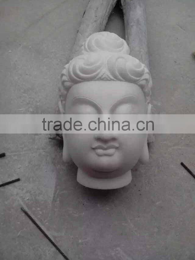 white marble stone buddha head
