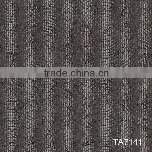 Durable level loop carpet tiles with PVC backing