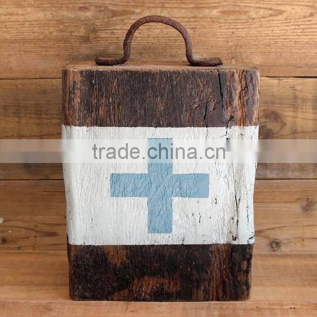 older aged wooden door stop