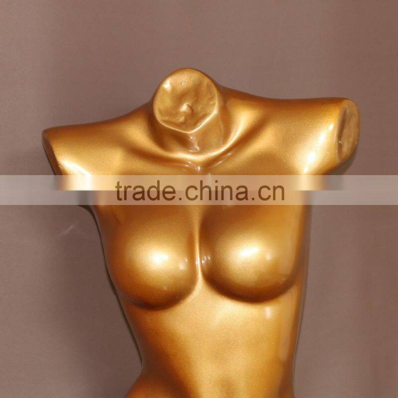 Bright gold upper-body female mannequin