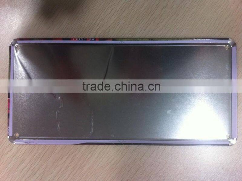 Embossed custom embossed license plate