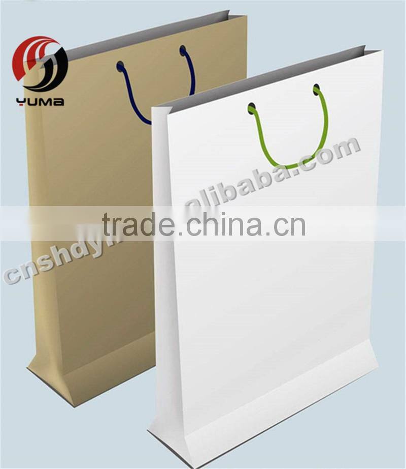 gold round cake board with tab paper bag