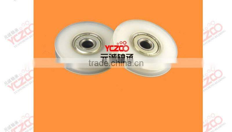 Low friction gate door roller with nylon