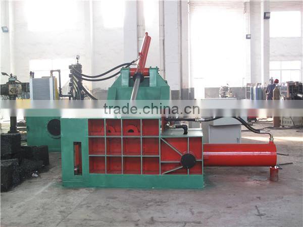 Horizontal baler with manual belting