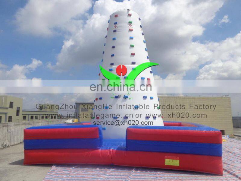 Inflatable climbing wall with obstacle course