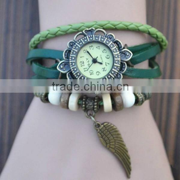 bulk buy from china Quartz watch F-05 for girls with Wing pendant,leather strap, bronzed watch case