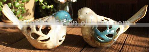Ceramic bird home decoration with hollowed out shape