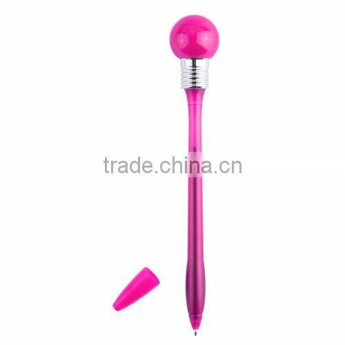 ballpoint pen with a flashing light on the top