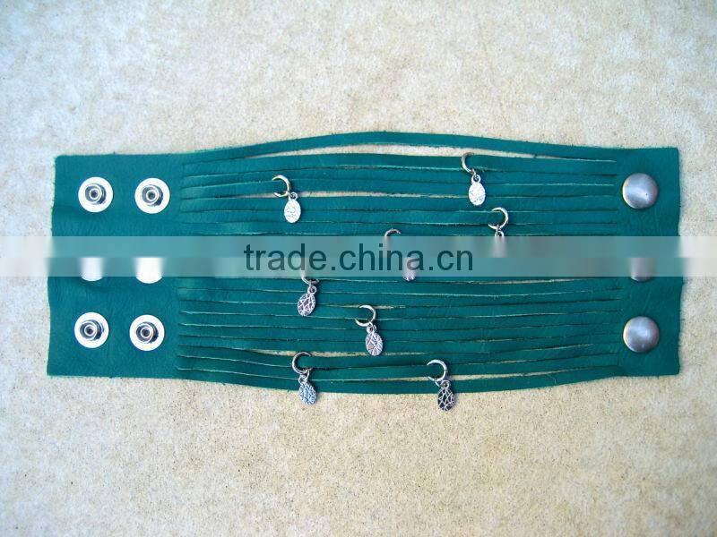 sliced leather bracelet, wide Leather Cuff - Charms Bracelet, Multi Strap Bracelet with peace and gun charms