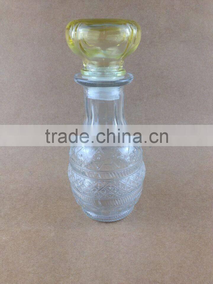 clear body yellow lid glass diffuser bottle