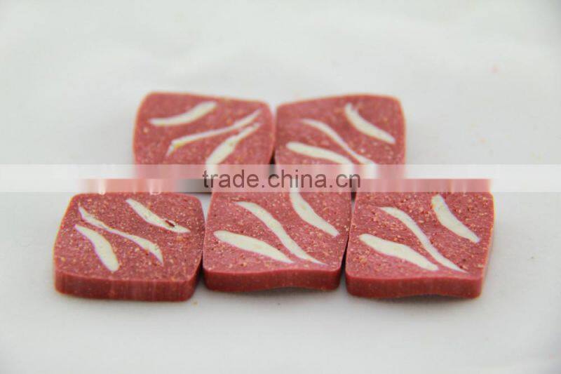 scraper blades (shaped squared beef pieces)