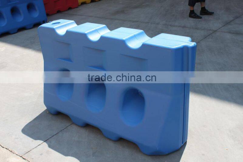 Plastic water filled road barrier three holes