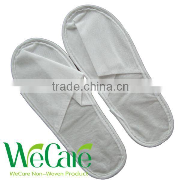 Cheap disposable non woven indoor hotel slippers with logo printed