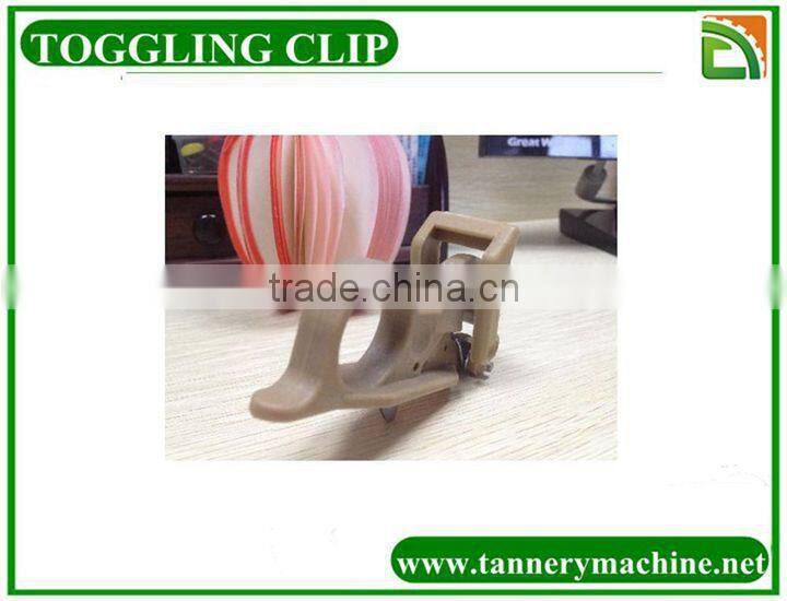 leather toggling machine clip